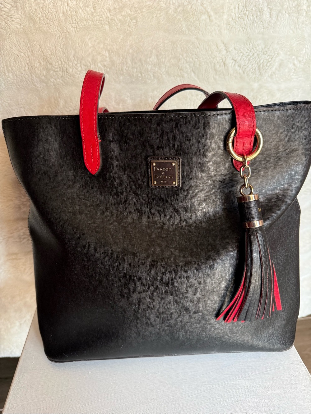 Dooney & Bourke Black Tote with Red Handles and Tassel